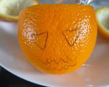 A picture of step 1 of Jack-o-Lantern Jello Heads:.