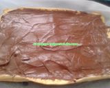Foto del paso 3 de la receta Brazo de gitano relleno de nutella con nata