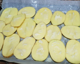 Foto del paso 3 de la receta: Patatas asadas con ali-oli