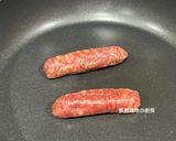A picture of step 2 of Corn and Sausage Tamagoyaki.