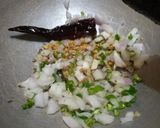 A picture of step 2 of Coconut rice in 10 minutes.