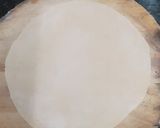 A picture of step 2 of Indian flatbread (chapati) using soy milk.