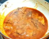 A picture of step 11 of Chicken Rogan Josh.