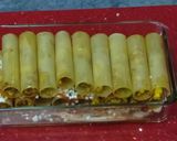 A picture of step 9 of Italian lasagna cannelloni filled with Indian paner tikka.