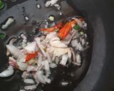 A picture of step 2 of Spring onion fry.