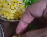 A picture of step 3 of Corn 🌽 Capsicum 🫑 Cheesy Toast.