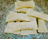 A picture of step 5 of Spaghetti wraps.