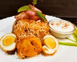 A picture of step 10 of Egg Dum Biryani.