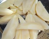 A picture of step 5 of Potato Masala Wedges.