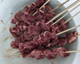 A picture of step 2 of Chicken heart kebabs with peanut satay dip.
