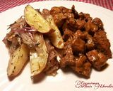Foto del paso 18 de la receta Patatas orgánicas al horno con cebolla roja y pinchos morunos