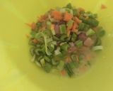 A picture of step 4 of Chicken consomme.