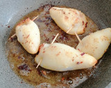 Foto del paso 9 de la receta: Calamares rellenos con langostinos Sabor Cookpad
