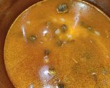 Foto del paso 4 de la receta: Arroz con calamares en salsa americana en olla GM