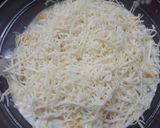 A picture of step 5 of Potato baked dish with garlic bread.