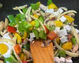 A picture of step 2 of Green Thai curry with steamed rice.