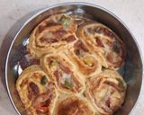 A picture of step 9 of Pizza Pinwheels.