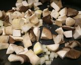 A picture of step 1 of Chicken and porcini mushrooms in a saffron and white wine sauce.