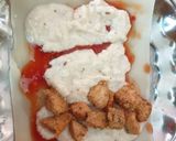A picture of step 5 of Chicken Alfredo Lasagna Rollup.