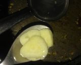 A picture of step 2 of Hyderbadi achri bindhi.