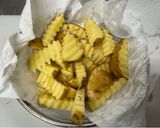A picture of step 1 of Fried Potatoes with cheese and Japanese sauce.