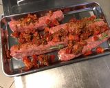 Une image de l'étape 6 de Saucisses de Toulouse grillées aux tomates,romarin et épices.