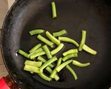 A picture of step 1 of Stir fry green veggies & bread.
