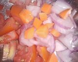 A picture of step 2 of Onian tomato carrot salad.