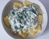 Une image de l'étape 7 de Gnocchis sauce crémeuse aux parmesan, épinards et lardons.