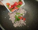 A picture of step 2 of Stir-Fried Pork with Bell Peppers and Onions.