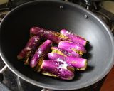 A picture of step 7 of Andhra Style Gutti Vankaya Pulusu Koora /Stuffed Brinjal Gravy Curry.
