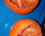 Foto del paso 2 de la receta: Asado, vacío y chuletas de cerdo con tomates rellenos