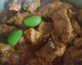 A picture of step 3 of Coconut chicken curry.