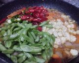 Foto langkah ke 4 dari resep Oseng Buncis Telur Wortel.