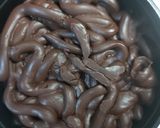 A picture of step 3 of Chocolate kitkat cake.