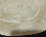 A picture of step 4 of Khasta bal wala chaki ke atty Ka paratha.