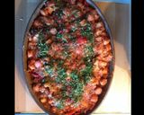 Une image de l'étape 4 de Gratin d attieke aux saucisses poivrons tomates et champignons.