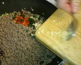 A picture of step 20 of Beefed up Chilli Con Carne, with fresh chillies.