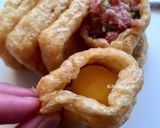 A picture of step 9 of Japanese Pork and Egg Tofu Pouches (Nikuman-Inspired).