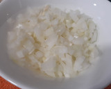 Foto del paso 5 de la receta: Calabacín relleno con cebolla y mijo