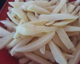 Foto del paso 4 de la receta: Alitas de pollo al limón a la parrilla con papas fritas