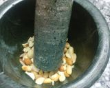 A picture of step 8 of Spnich rabdi with peanuts & Chocolate balls.