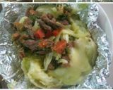 Foto del paso 4 de la receta: Papa rellena de arrachera y sirlon