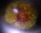 A picture of step 7 of ALU gajar matar meithe,.