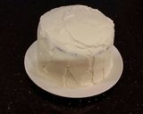A picture of step 21 of Mocha Layer Cake with Whipped Mascarpone Cream and a Coffee Glaze Drizzle.