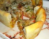 A picture of step 18 of Deep dish kabab pizza.