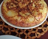 Foto del paso 8 de la receta: Tortilla de patatas rellena de queso y jamón adobado (con cebolla)