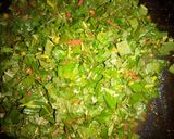 A picture of step 6 of Nigerian rice & greenish sauce.