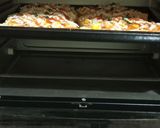 Foto langkah ke 5 dari resep Pizza roti simple.