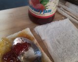 A picture of step 2 of One bite pin wheel sandwiches.